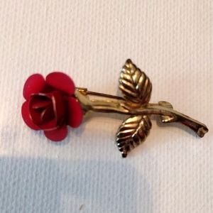 Beautiful gold red rose brooch.